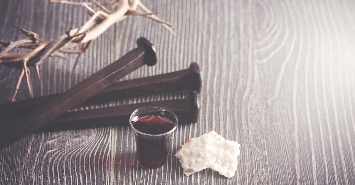 Communion juice and crackers with the nails and crown of thorns